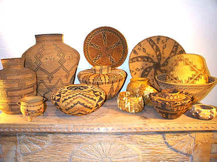 Indian baskets from Len Wood's Indian Territory Gallery in Laguna Beach, California include examples from throughout the Western USA. These early museum-quakity ,investment- grade examples include many forms and technologies that disappeared after the Great Depression of the 1930's. All the baskets in this photo date circa1860-1930 and include Chumash, Yokuts, Pauite, Washo, Mission and Apache among others. Click photo to view our current catalog of antique baskets for sale.